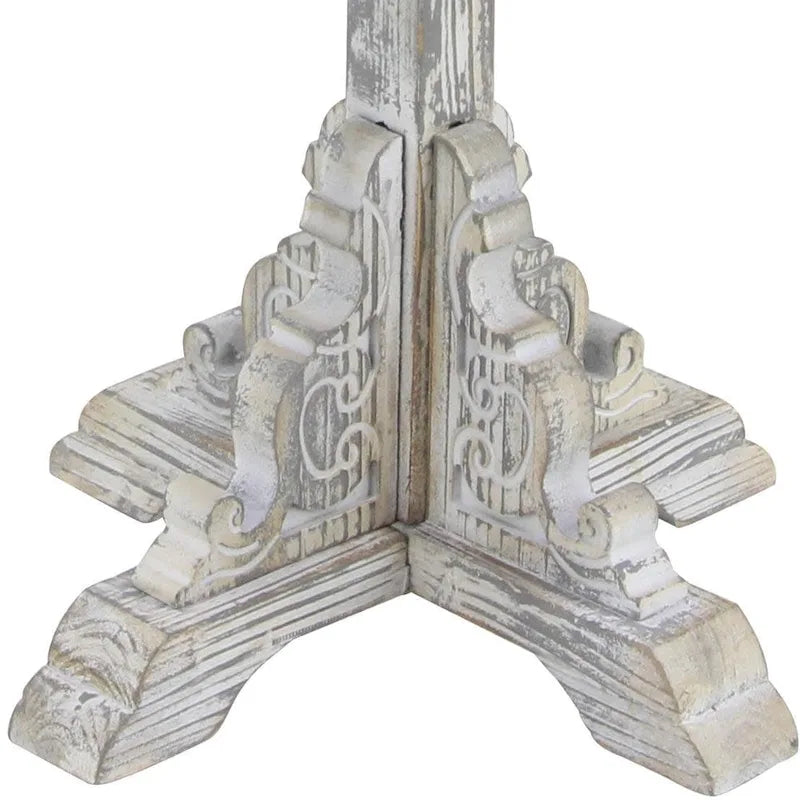 Mesa auxiliar redonda con acento de madera blanca y gris, base en X con detalles florales tallados, 1 persona