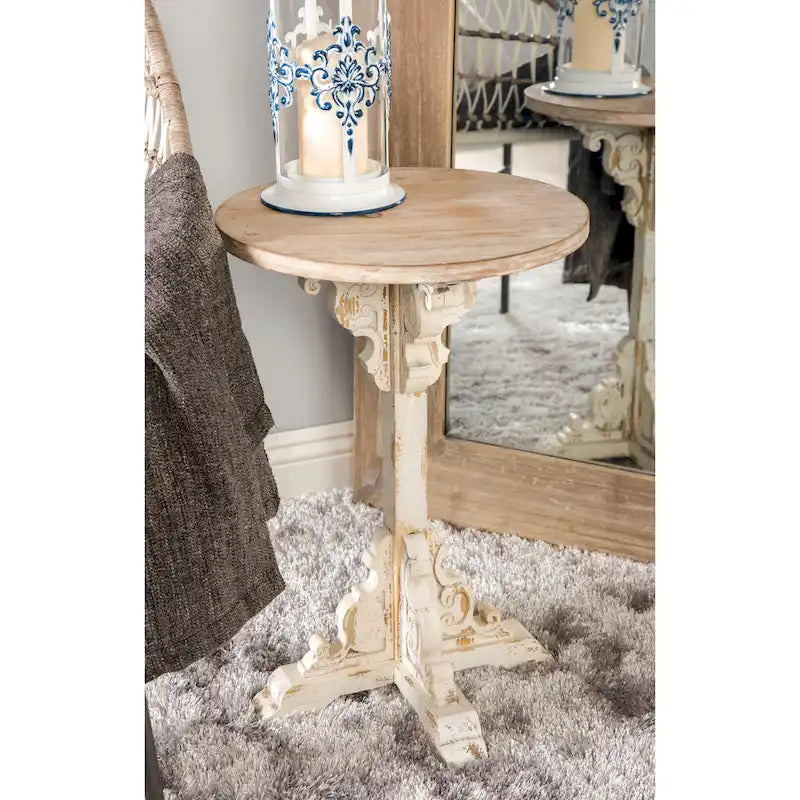 Mesa auxiliar redonda con acento de madera blanca y gris, base en X con detalles florales tallados, 1 persona